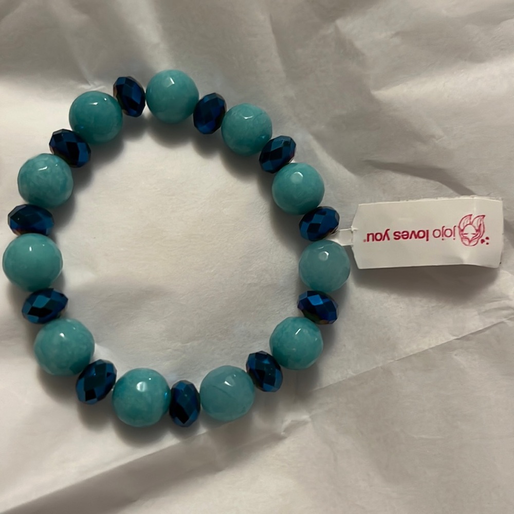 Teal natural stone with beautiful navy crystals by JO Jo Loves you.